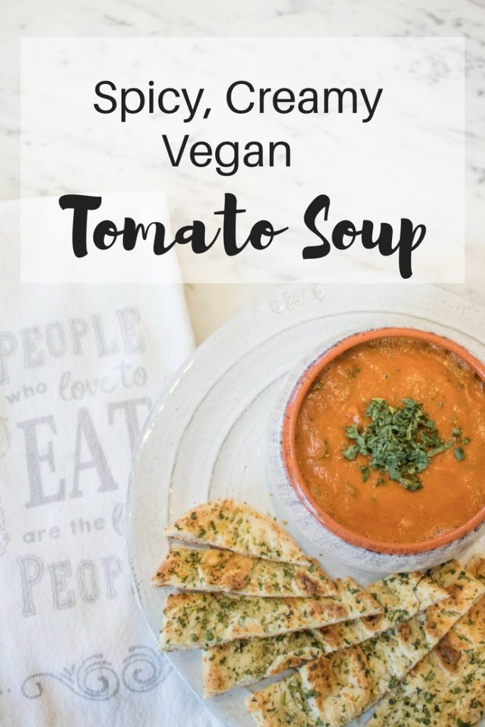 The best creamy roasted tomato soup recipe you'll try! It's packed full of tons of veggies. So healthy, yet super comforting! | vegan | dairy free | whole 30 |