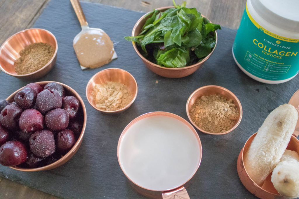 Chocolate Cherry Smoothie, very healthy, easy, filling, and satisfying breakfast, perfect for on the go. Includes protein, fiber, fat, superfoods like maca and cacao and greens according to the #fab4 method that will keep you full and help keep your blood sugar balanced. So healthy!