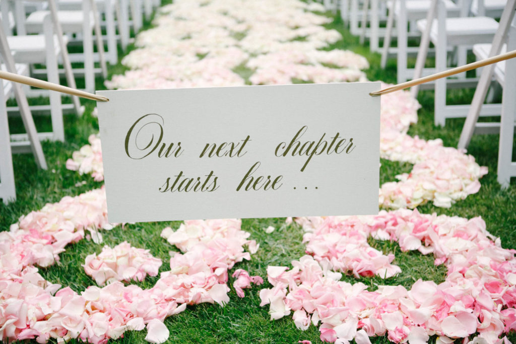 Our next chapter starts here, ceremony sign for the aisle 