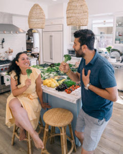 Lena and Bassam doing kareoke while produce prepping