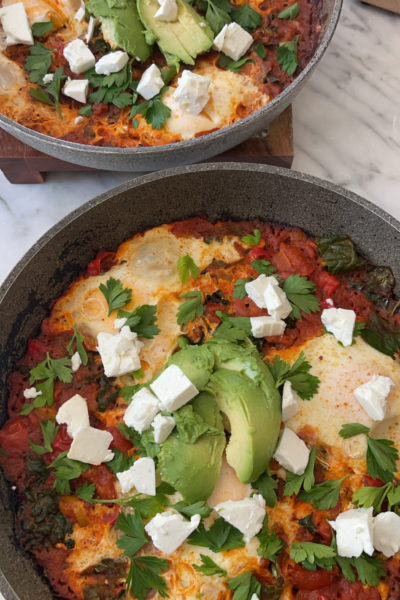 photo of two pans containing vegetable shakshuka